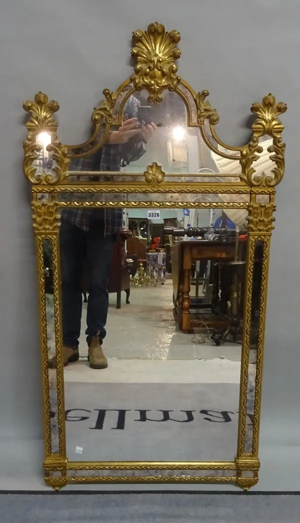 A modern giltwood arch top marginal mirror, 64cm wide x 125cm high.