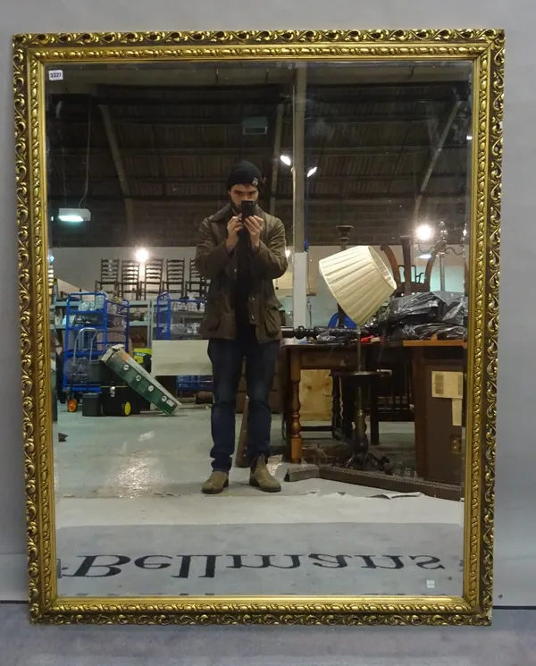 A modern gold painted rectangular mirror with bevelled glass, 120cm wide x 151cm high.