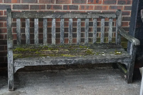 A modern slatted garden bench, 155cm wide.