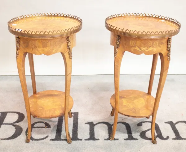 A pair of 20th centuary kingwood and marquetry inlaid circular two tier occasional tables with galleried tops, 32cm wide x 59cm high.