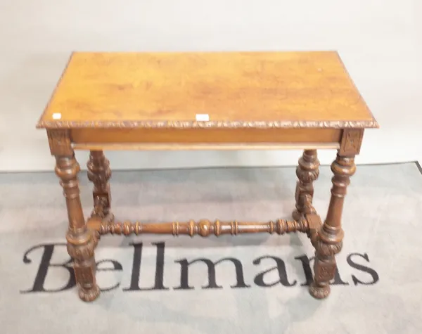 A late Victorian oak side table on turned block supports, 88cm wide x 72cm high