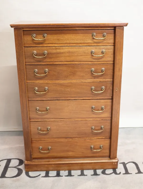 A late 19th century mahogany Wellington chest with seven drawers on a plinth base, 75cm wide x 111cm high.