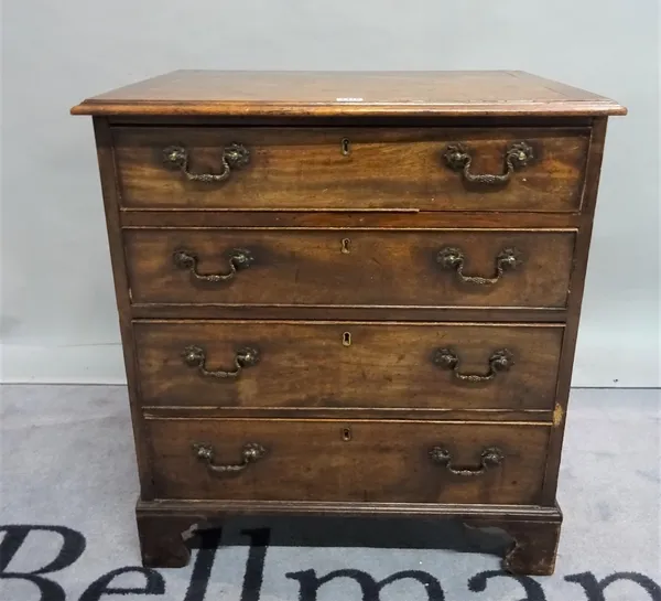 A late 18th century mahogany commode chest of four long graduated drawers on bracket feet, 67cm wide x 74cm high.