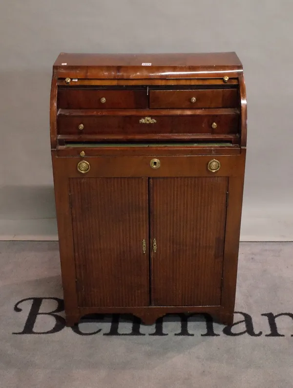 A 19th century mahogany cylinder bureau with cupboard drawer base on bracket feet, 65cm wide x 98cm high.