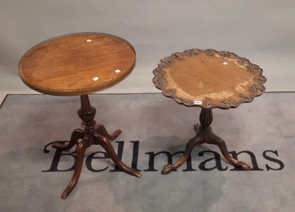 A Victorian mahogany low tripod table with carved top on three outswept supports, 52cm wide x 50cm high and an early 20th century mahogany circular oc