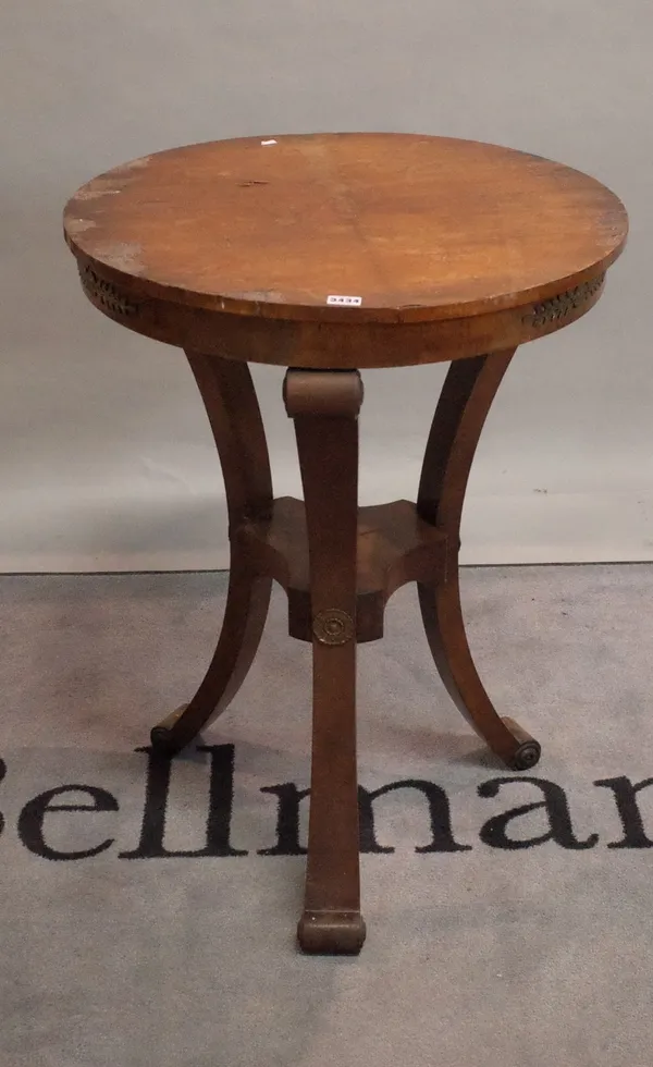 A Regency walnut and gilt metal mounted circular occasional table, 64cm diameter x 82cm high.