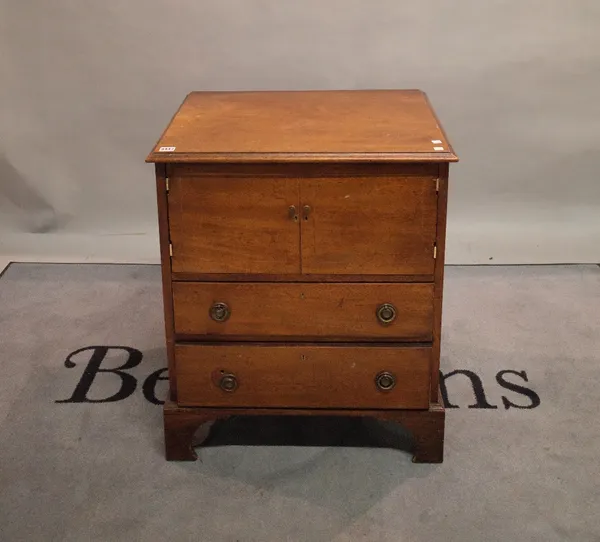 A late George III mahogany commode chest over two drawers on bracket feet, 64cm wide x 75cm high.