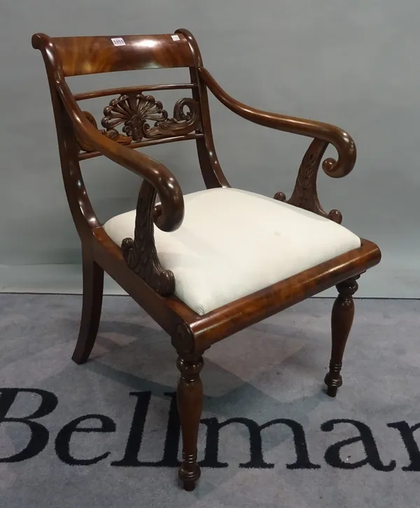 A 19th century mahogany bar back open armchair on turned suppports, 53cm wide x 83cm high.