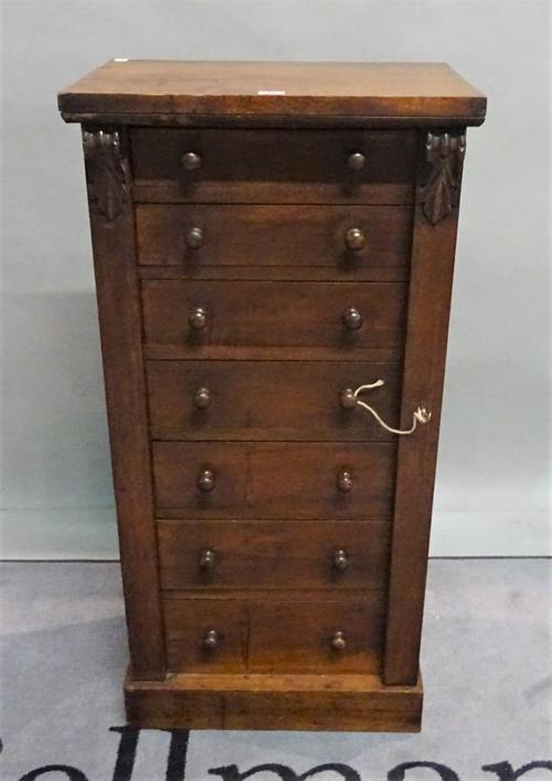 A 19th century mahogany Wellington chest, with seven graduated drawers and plinth base, 51cm wide x 104cm high.