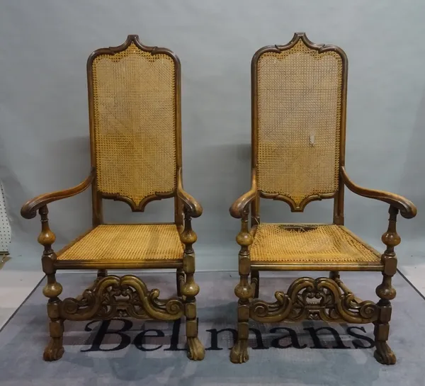 A set of four 19th century Flemish style highback open armchairs on turned supports, 66cm wide x 131cm high.
