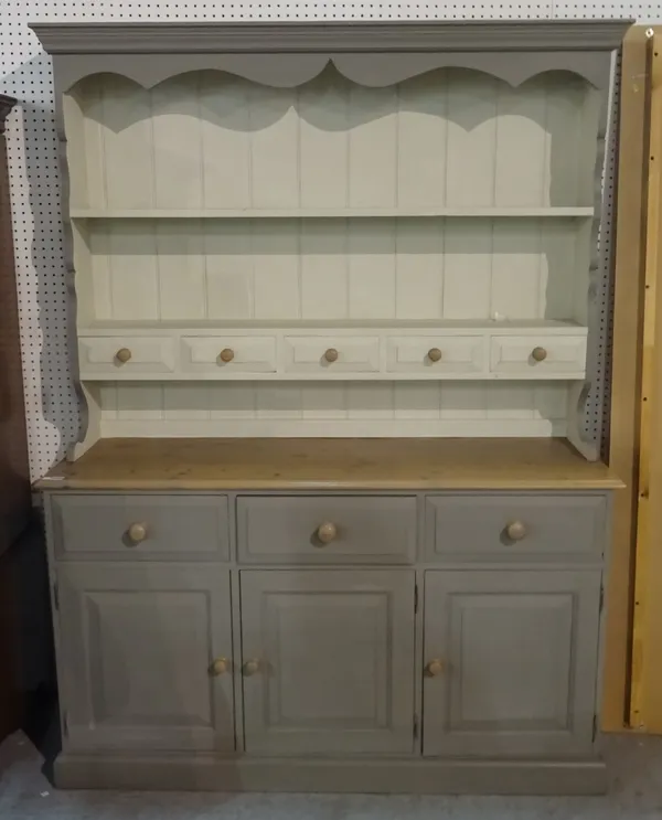 A modern grey painted pine kitchen dresser with a two tier plate rack over a three drawer cupboard base, 147cm wide x 200cm high.