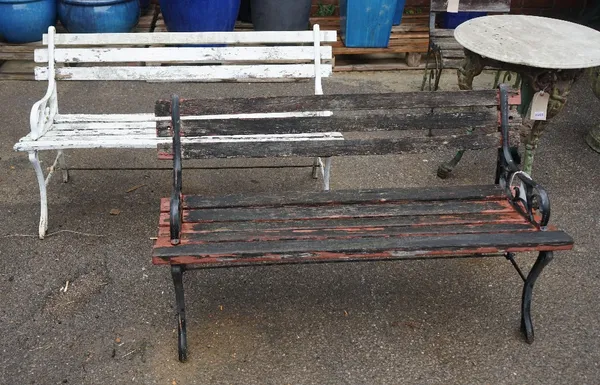 A pair of modern hardwood and cast aluminium slatted garden benchs, 122cm wide x 86cm high.