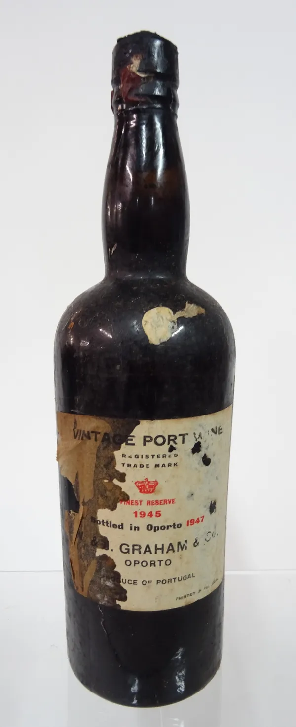 One bottle of Graham & Co Vintage port 1945 (seal in tact, wine half depleted).