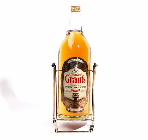 A 4.5l bottle of Grants Finest Scotch Whisky 43% Vol, in a cradle.