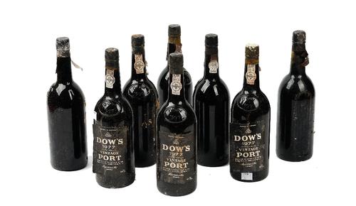 Eight bottles of Dow's 1977 vintage Port.