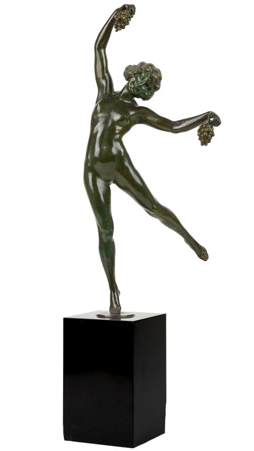 After Pierre Le Faguays (French 1892-1962) Art Deco patinated bronze dancing girl with grapes, signed to the marble plinth 'Le Faguays', 64.5cm high o