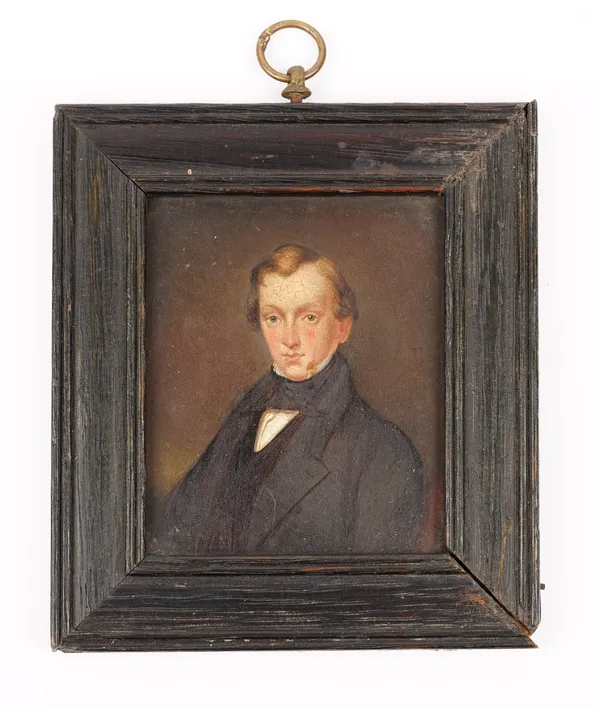 An early 19th portrait miniature depicting a gentleman painted on metal within an ebonised frame, unsigned, 8cm x 7cm.