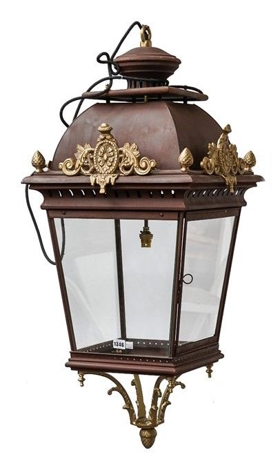 A pair of Victorian style hanging lanterns, modern, each of square tapering form with domed surmount and gilt metal finials, and a single light fitmen