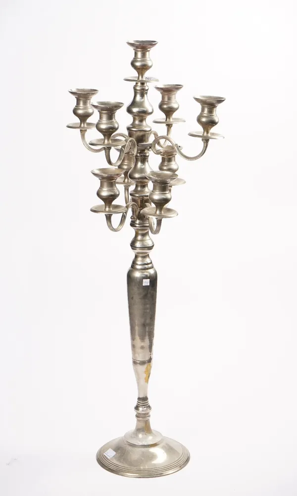 A modern nine branch floor standing chrome candelabra, 117cm high x 45cm wide.