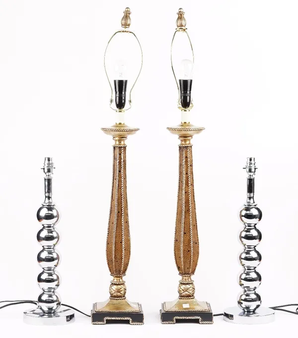 A pair of modern table lamps, with tapering slender columns, 70cm high, and another pair of polished chrome ball lamps, 48cm high, both pairs with sha