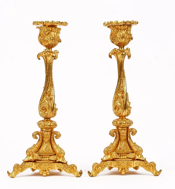 A pair of Victorian gilt-bronze candlesticks, by Elkington & Co., 1843, each cast in the Rococo style, stamped E & Co., date letter 3, with detachable