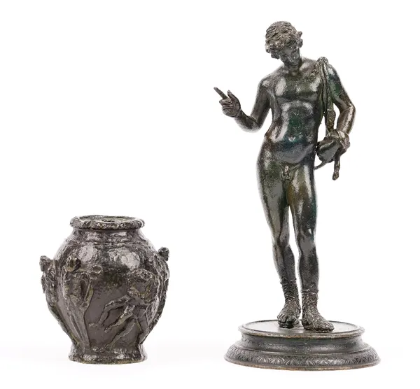 After the antique, a bronze sculpture of Narcissus, 24cm high, together with a small bronze vase decorated with figures in relief, 10cm high, (2).