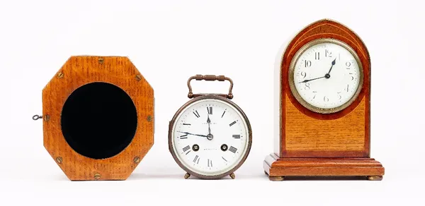 Cooke & Kelvey, Calcutta & Paris, a brass cased drum clock, visible platform escapement, twin train movement striking on a bell, fitted in an oak trav