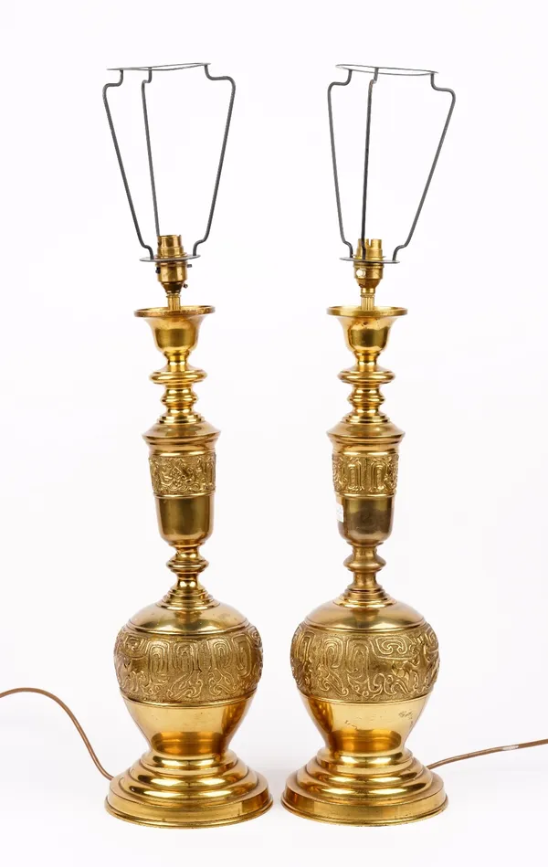 A pair of modern brass table lamps, decorated in the Chinese style, 55cm high.