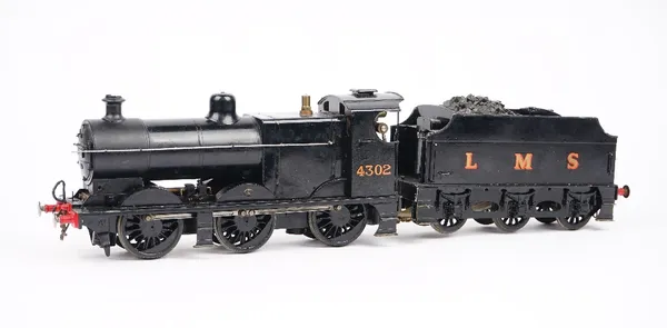 A 1 1/2 inch gauge live steam model of a 0-4-0 L.M.S locomotive and tender, NO. 4302, finished overall in black, 53cm long. 2127