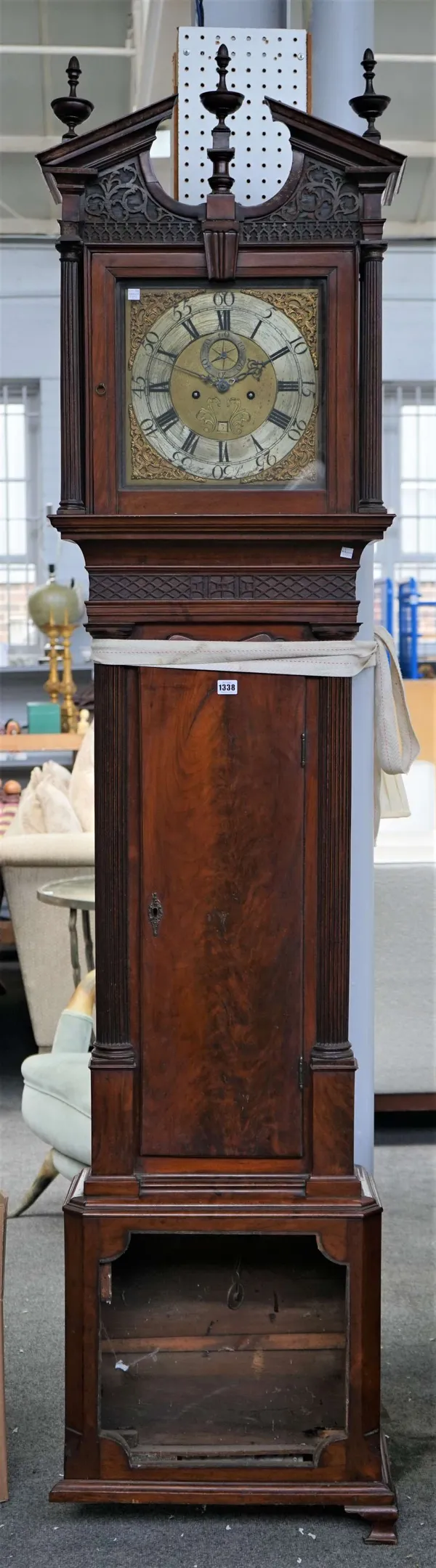 A mahogany longcase clock, the dial inscribed Joseph Finney, Liverpool, the 12" dial with Arabic and Roman numerals, enclosed by pieced gilt spandrels