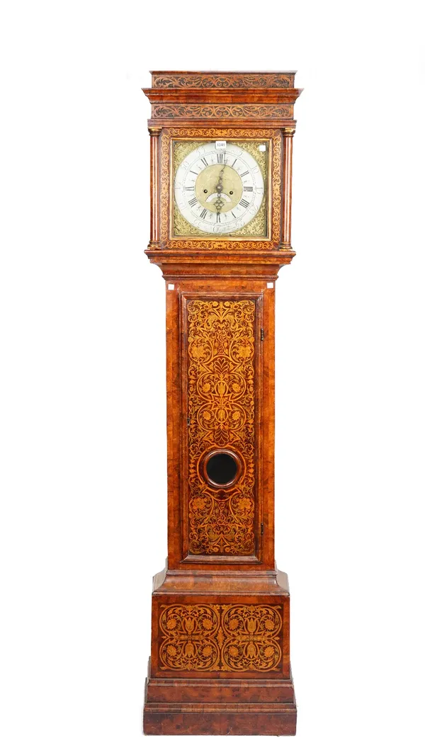 A walnut and marquetry inlaid longcase clock, the associated 12 inch square brass dial, signed James Butterworth, one pendulum, 214cm high.