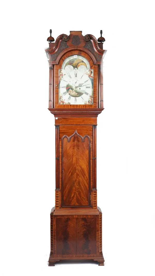 A late George III mahogany and chequer inlaid longcase clock, the white painted arch top dial signed J & R Buckley Hartshead, the glazed hood with bli