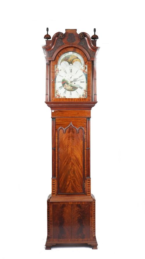 A late George III mahogany and chequer inlaid longcase clock, the white painted arch top dial signed J & R Buckley Hartshead, the glazed hood with bli