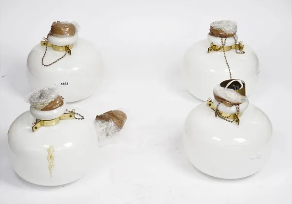 A set of four opaque glass and brass mounted pendant ceiling lights, 28cm diameter.