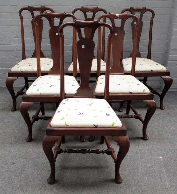 A set of six 19th century walnut vase back dining chairs, of Queen Anne design on pad feet, (6).