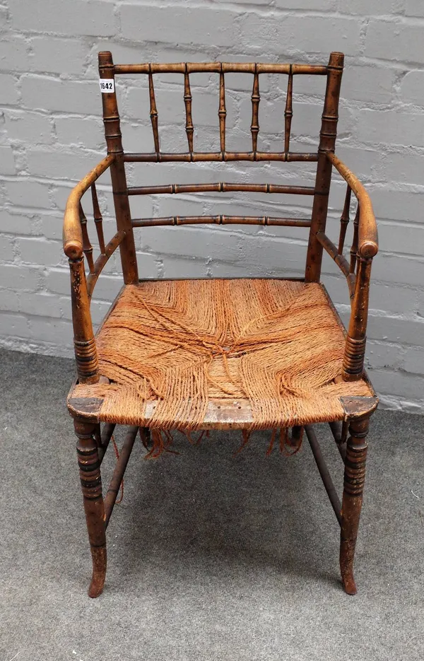 Possibly William Morris, a 19th century turned and painted beech faux bamboo open armchair on splayed supports, 51cm wide x 86cm high.