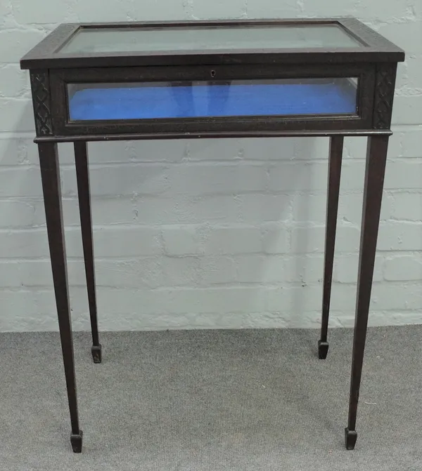 A late 19th century mahogany blind fret carved bijouterie table, on tapering square supports, 58cm wide x 76cm high.