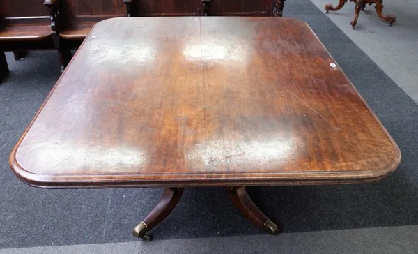 A late George III mahogany rectangular snap top breakfast table on four scroll supports, 160cm wide x 74cm high.