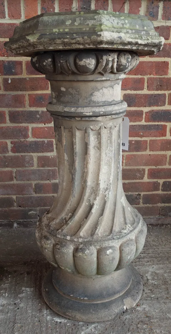 A 19th century terracotta pedestal of fluted baluster form, on stepped circular base, 120cm high.