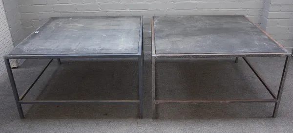 A pair of modern square slate top occasional tables on box metal frames, 88cm wide x 51cm high.