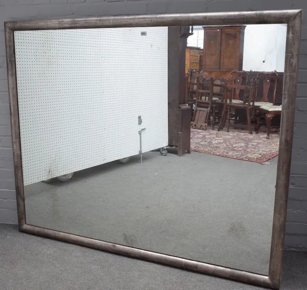 A large 20th century rectangular mirror, in silvered frame, 176cm wide x 144cm high.