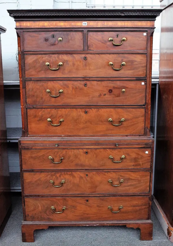 A George III satinwood and kingwood banded mahogany chest on chest with two short over six long drawers divided by brushing slide on bracket feet, 110