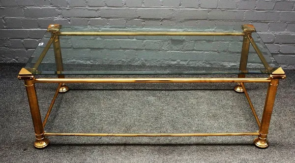 A 20th century lacquered brass and glass rectangular coffee table, on octagonal supports, 120cm wide x 44cm high.