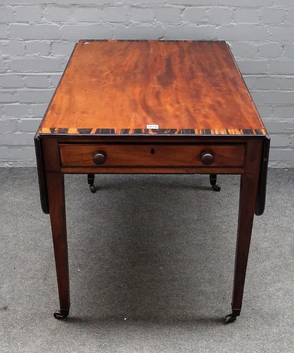 A George III coromandel banded mahogany Pembroke table, on tapering square supports, 91cm wide x 72cm high.