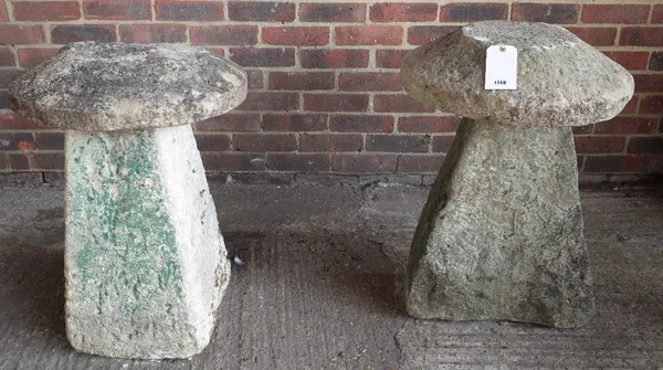 Two carved staddle stones, with tapering square bodies, 53cm diameter x 66cm high.