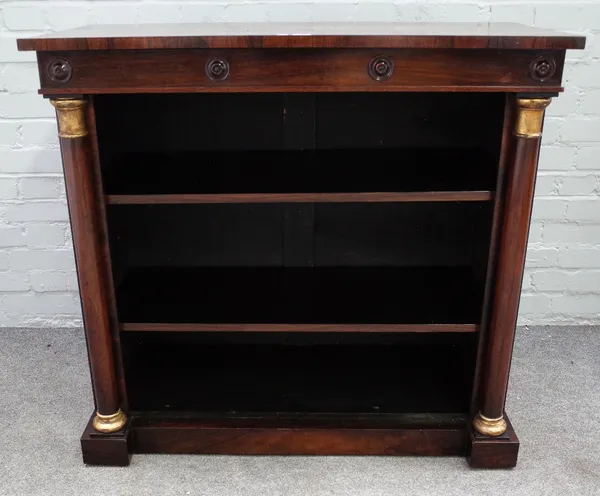 A Regency rosewood floor standing open bookcase, with gold painted turned columns, 100cm wide x 93cm high.