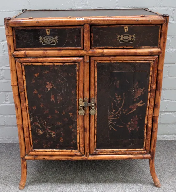 A Victorian bamboo and lacquer side cabinet, with pair of drawers over cupboards, 67cm wide x 82cm high.