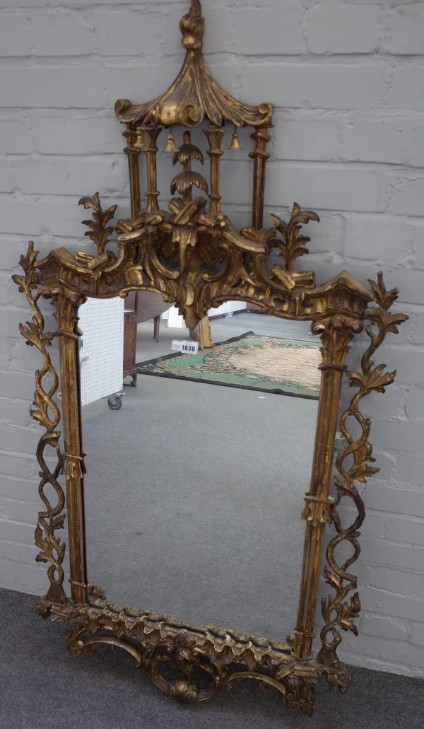 A 19th century Chinese Chippendale revival gilt framed mirror, with pagoda crest over pierced frame and opposing 'C' scroll lower frieze, 79cm wide x