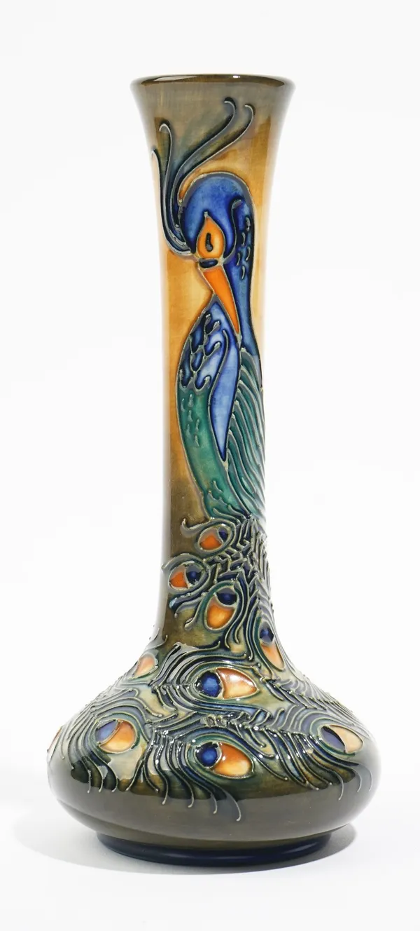 A Moorcroft vase designed by Rachel bishop, circa 1996, tube-lined and decorated with a peacock, impressed and painted marks, 21cm. high.