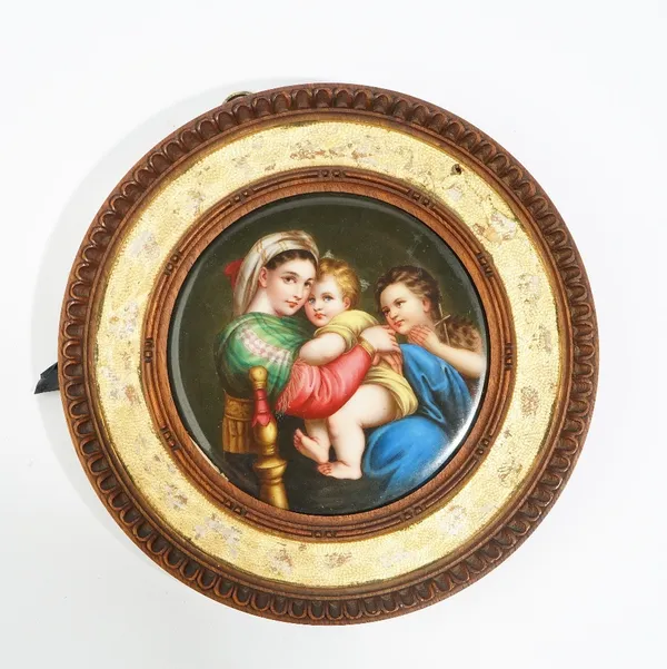 A Continental porcelain circular plaque, Italian or German, late 19th century, painted with the Madonna della Seggiola after Raphael, impressed numera